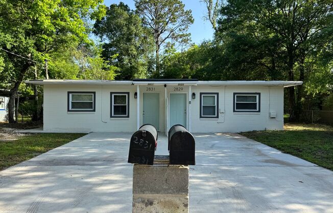 Just Renovated & Move-In Ready! 2BR/1BA Duplex on W 6th St – Pets Welcome!