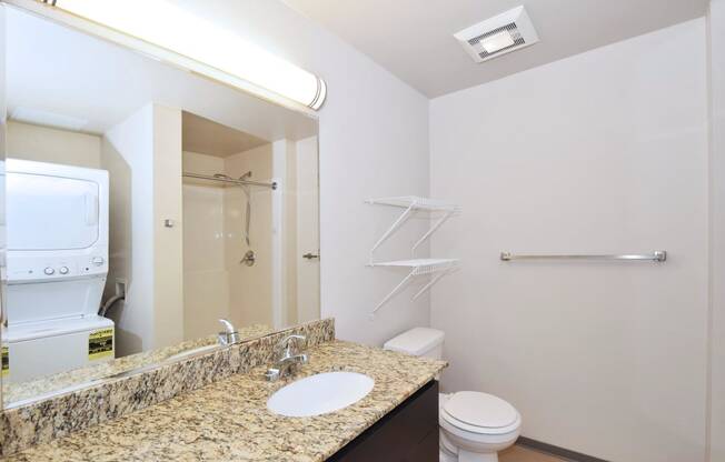 a bathroom with a sink and a toilet