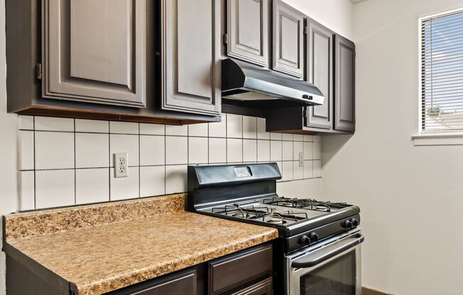 Utilities Paid! Freshly Updated 3 Bedroom with Parking & in-unit Laundry