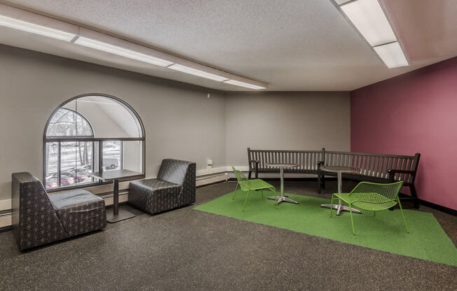 Business center with a variety of seating and tables