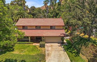 WELCOME HOME AND FALL IN LOVE WITH THIS BEAUTIFUL Mid-Century Spanish style home RENTAL near UCR.