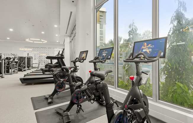 24/7 Fitness Center with Peloton Bikes at The Marc Luxury Apartments in Palm Beach Gardens FL