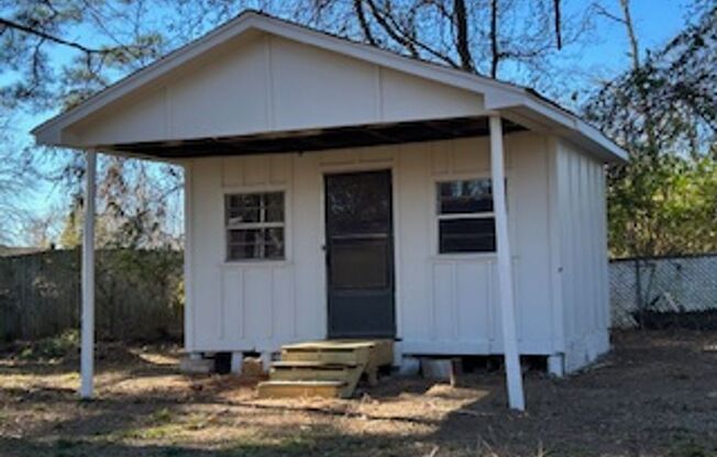 Updated Four Bedroom/Two Bath/Two Car Carport/Fenced/Storage Bldg