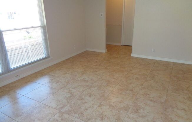 Exquisite Single Level Westside Home With Refrigerated Air Located In Quiet Neighborhood