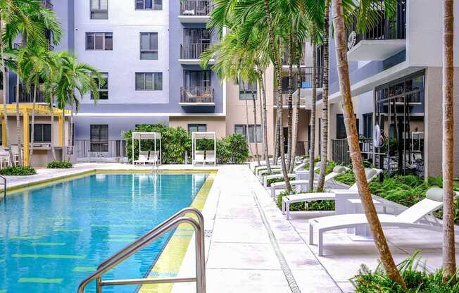 swimming pool and sun deck at Berkshire Coral Gables apartments