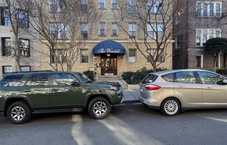 Top Floor Fully Furnished 1,000 Square Foot One Bedroom Plus Den in Kalorama