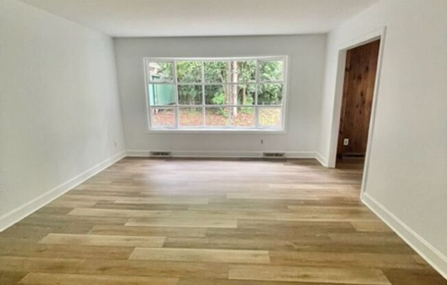 Classic 3 bedroom 1 1/2 bath ranch with great living spaces in popular Starmount neighborhood!