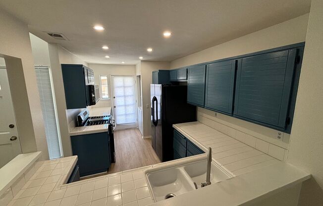 Spacious 2-Bedroom Condo with Loft & Resort Amenities in Gated Valencia Community!