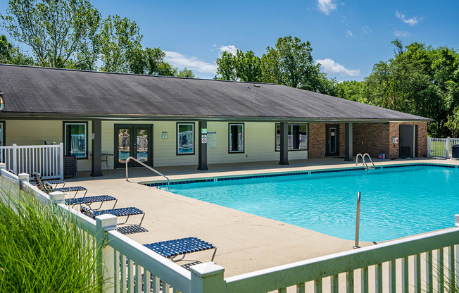 Fenced In Pool Area with with Lounge Furniture