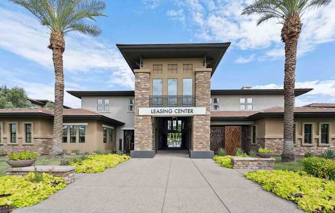 A building with a leasing center sign in front of it. at The Laurel Apartments, Chandler, AZ 85286