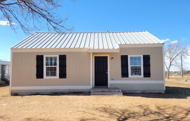 SLATON CHARMER! Totally Remodeled!! Available March 1st! 2/1 Polished Hardwood Floors!