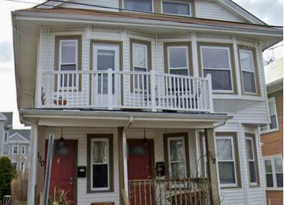 112 W ADAMS ST