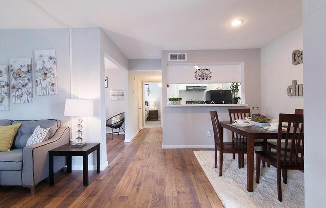 a kitchen with a dining room table