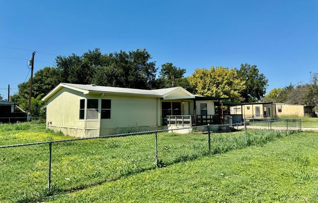 Home with MASSIVE Fenced Yard