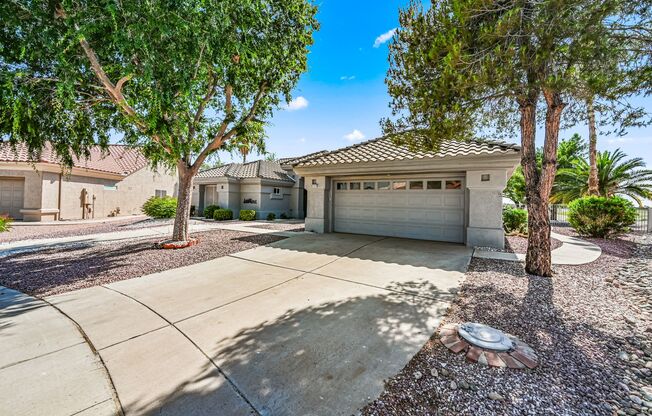 BEAUTIFUL REMODELED HOME WITH POOL AND BACKS GOLF COURSE !!