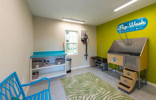 a play room with a hot tub and a table and chairs