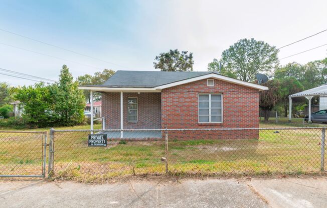 Brick home with a fenced-in yard!