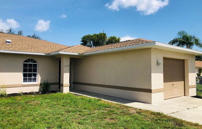 3 Bedroom 2 Bath SW Cape Coral Duplex with Garage and Screened Lanai