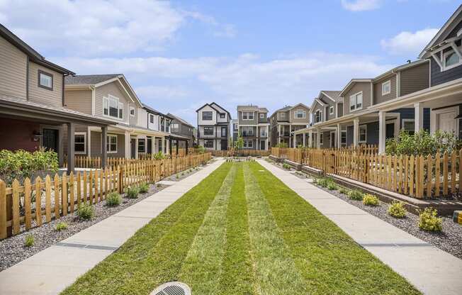 Fenced yards & individual porches.