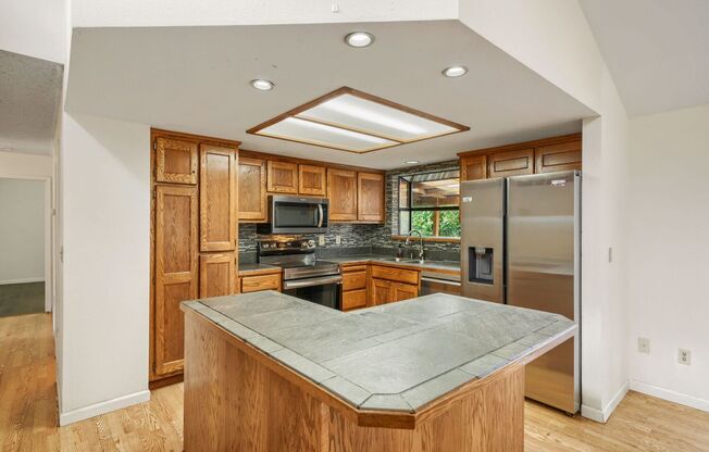 3-bed/2.5-bath Tri-Level Home on Lea Hill!