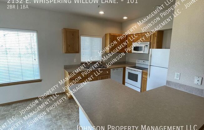 2132 E WHISPERING WILLOW LN 