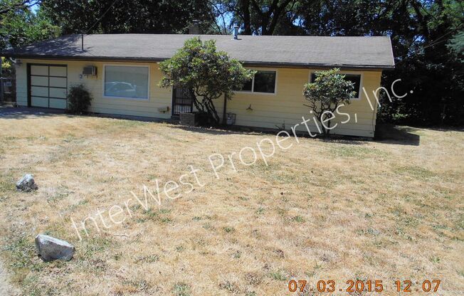 3 Bedroom Ranch Style on Cul De Saq with Fenced Yard, Wood Stove & Garage!