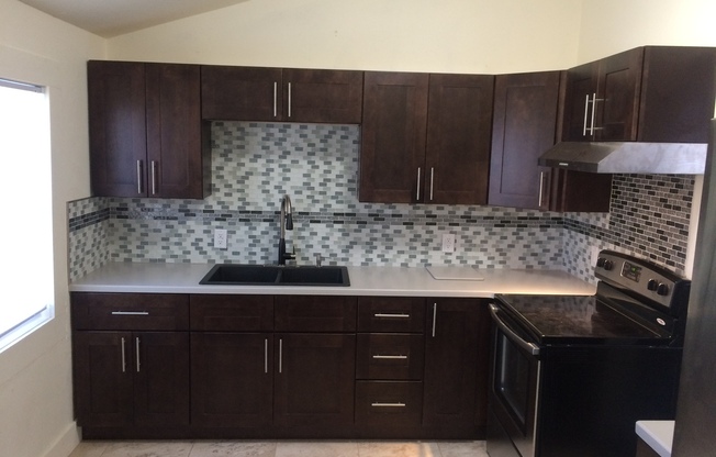 Remodeled premium 3 bed / 1 bath house with 2 car garage in great southside location