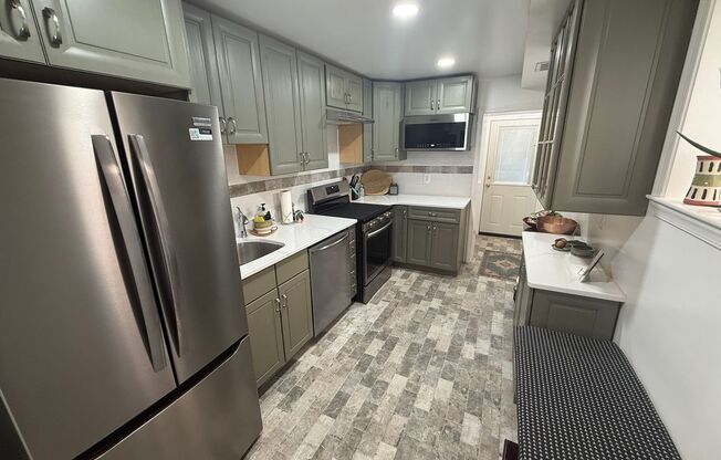 Fully Furnished & Elegantly Renovated Historic 3BR/2.5BA Home with Private Yard & Deck!