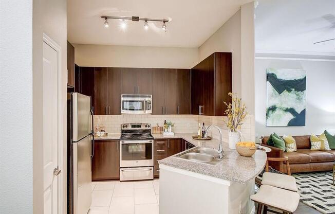 a kitchen with a sink and a counter top