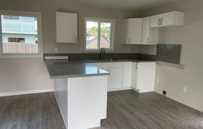 Kaneohe Duplex - Downstairs unit 2 bedrooms, 1.5 bath with 2 parking stalls - Avail now!