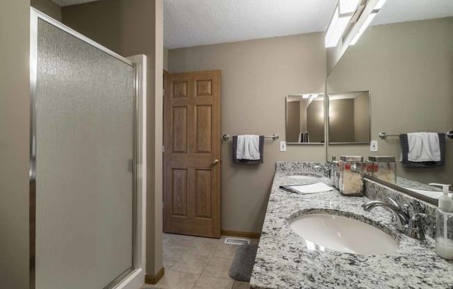 Master bath with shower and tub at at Southwind Villas in southwest Omaha in La Vista, NE, 68128