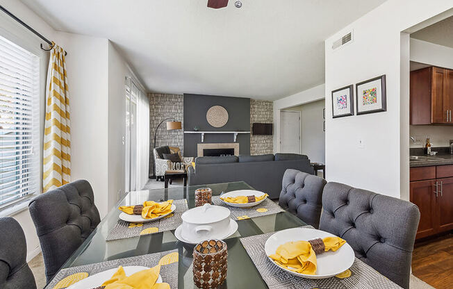 a living room with a table with plates of food on it