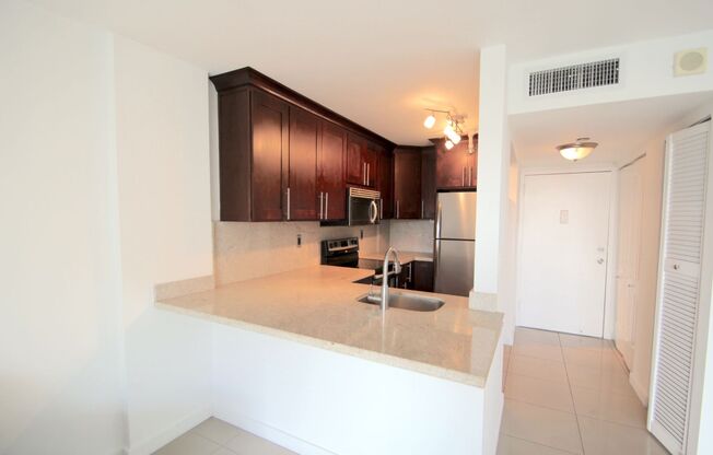 Spacious 1-Bedroom Condo at 1035 West Avenue with Access to Luxury Bayfront Amenities