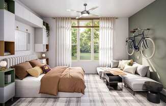 a bedroom with a bed and a couch and a ceiling fan at Link Apartments® CYKEL Apartments, Charlotte , 28208