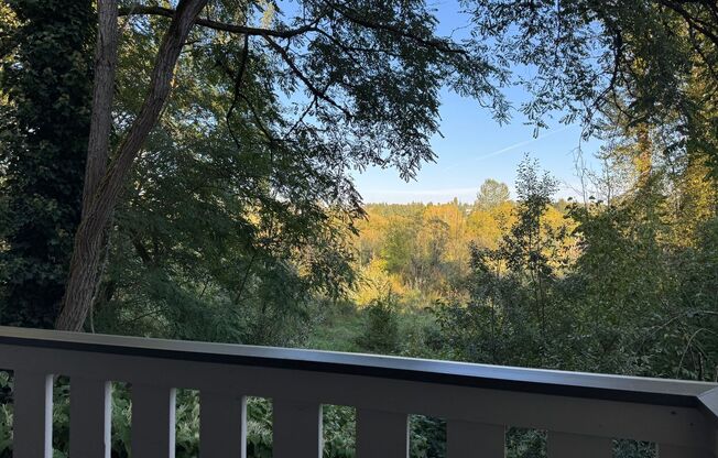 Serene Ground-Floor Condo Overlooking Green Space – Parking Included