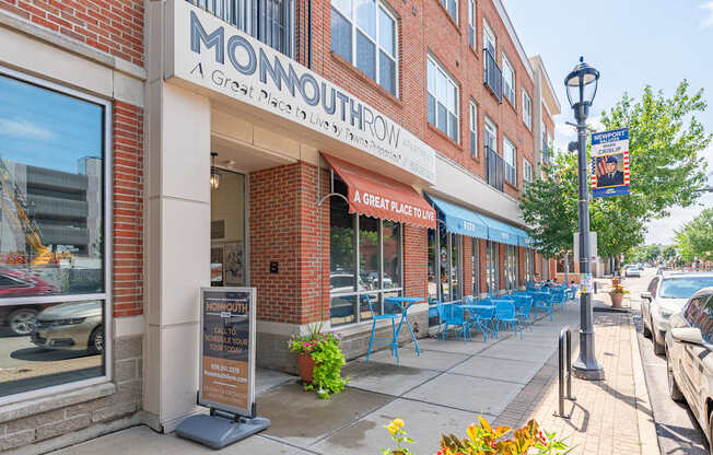 A street view of Monmouth with a sign that says "A Great Place to Live".