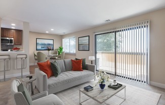 a living room with a couch and a table