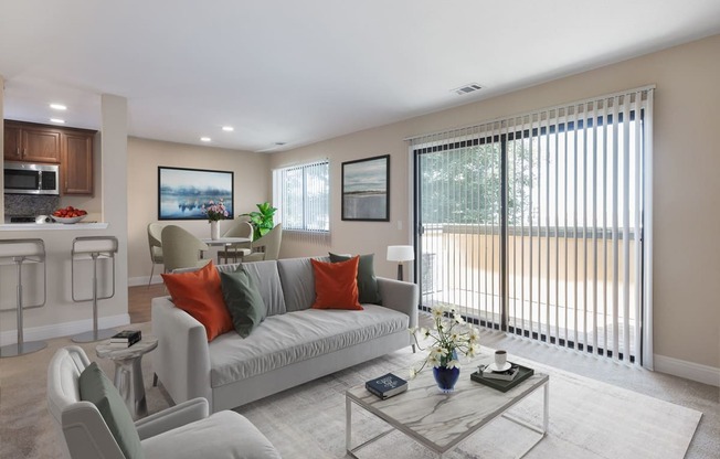 a living room with a couch and a table