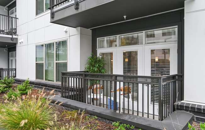 the front of a building with windows and a balcony at Link Apartments® Mint Street, Charlotte, North Carolina