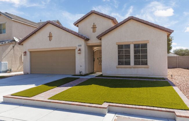 Immaculate single story home with great front and back yards