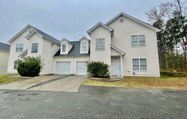 Must see 4 bedroom 2.5 bath townhouse with 1 car garage .