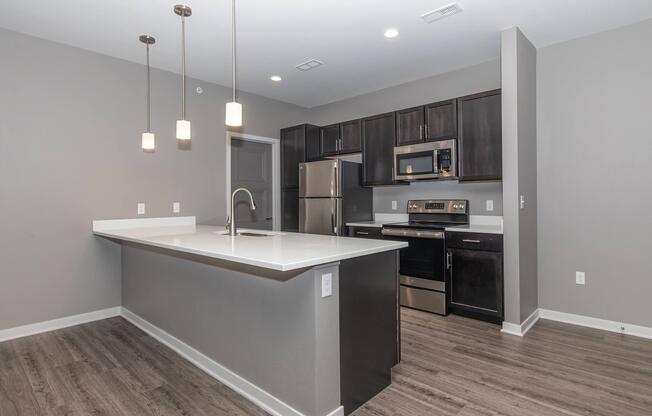 a kitchen with a table in a room