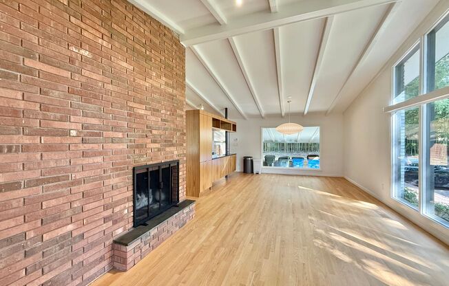 **OFFERING WAIVED APPLICATION FEES & $300 MOVE IN PROMOTION** Luxurious 4BD, 3BA Raleigh Home with Fenced In Yard, Bonus Living Space Downstairs, and in a Prime Location Near NC State, Downtown Raleigh, and Crabtree Valley Mall