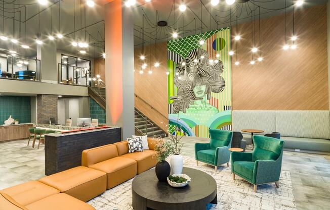 A vibrant resident lounge at Modera Westside Trail, where artful design and inviting seating meet easy access to Atlanta’s Westside Trail and city energy.