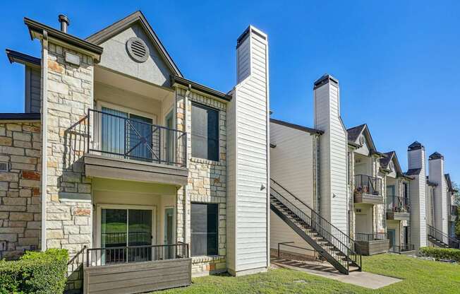 Exteriors of our cozy apartments at On the Green apartments in Austin, TX