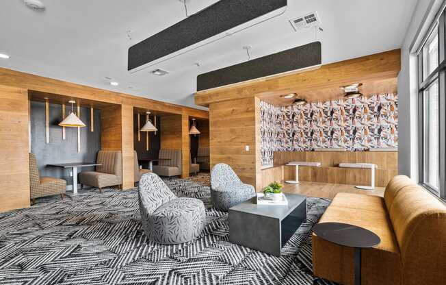 a room with a couch chairs and a coffee table