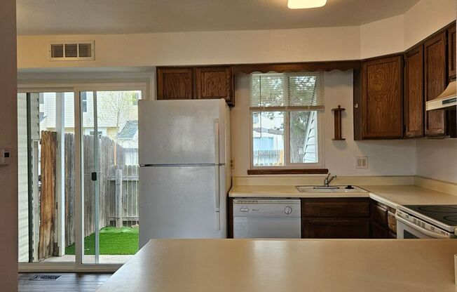 Adorable Loft Style One Bedroom Condo Steps from Buckley AFB