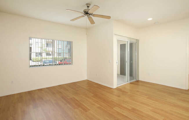 Living Room with Balcony and Hard Surfaced Flooring