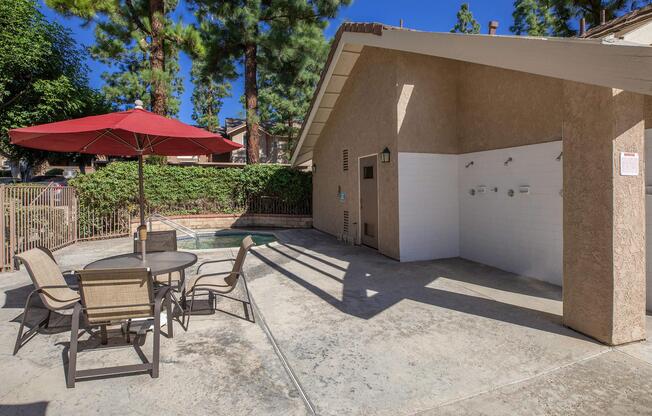 the community spa with a table and chairs