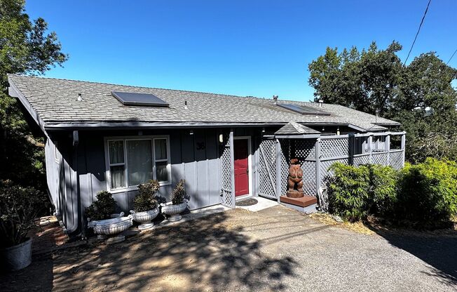 Three bedroom, two bathroom home with gorgeous views and sunroom for rent in the hills of Fairfax!